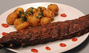 Coaste de porc la cuptor cu cartofi aromati